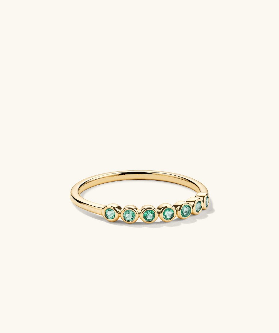 Rings | Mejuri Bezel Emerald Half Eternity Band